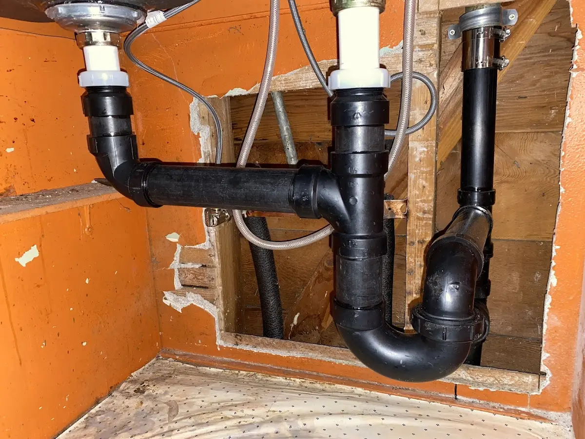 Professional Garbage Disposal Repair equipment and tools on the job in Georgetown